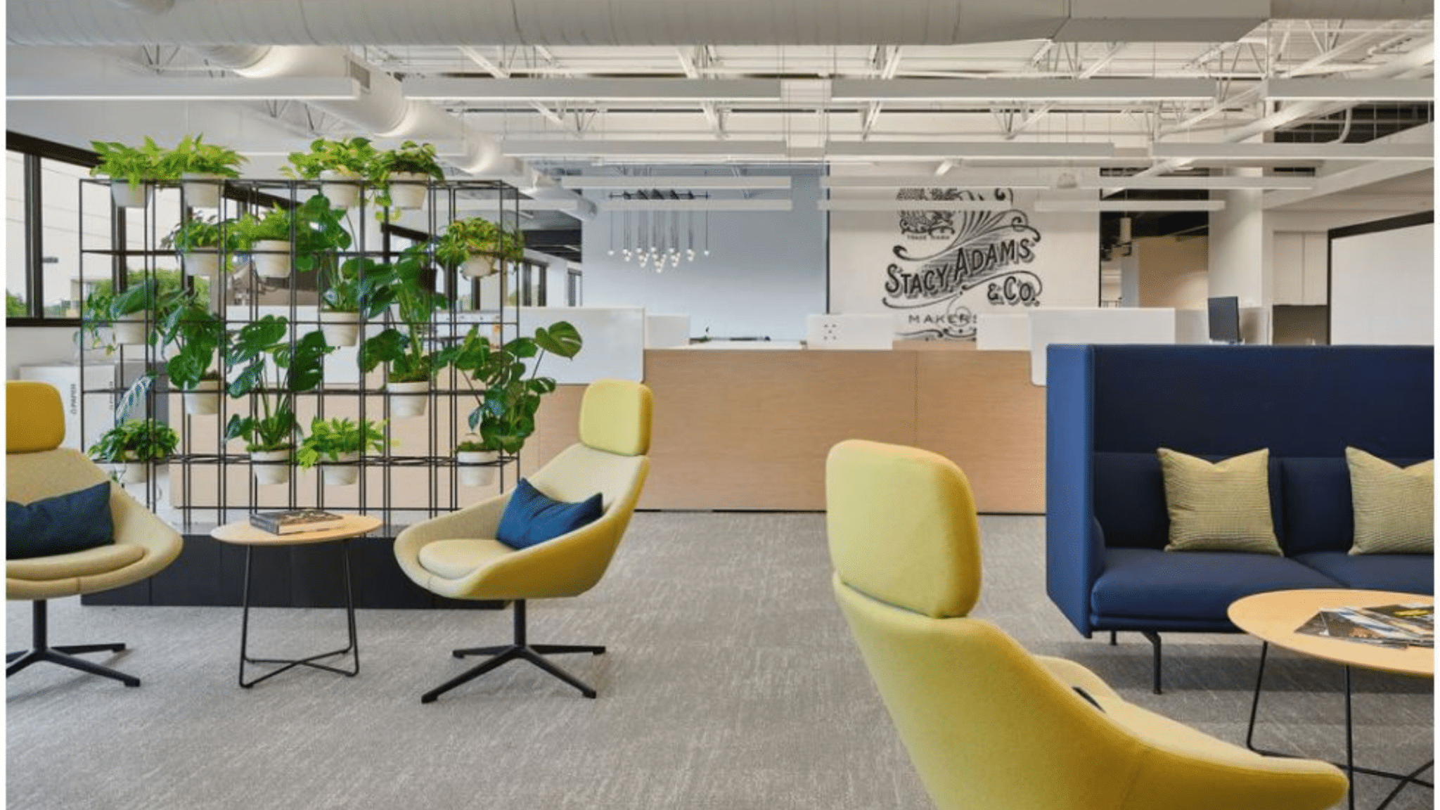 Explore the top 5 office furniture trends for 2024. Pictured are 2: flexible seating and biophilic elements.