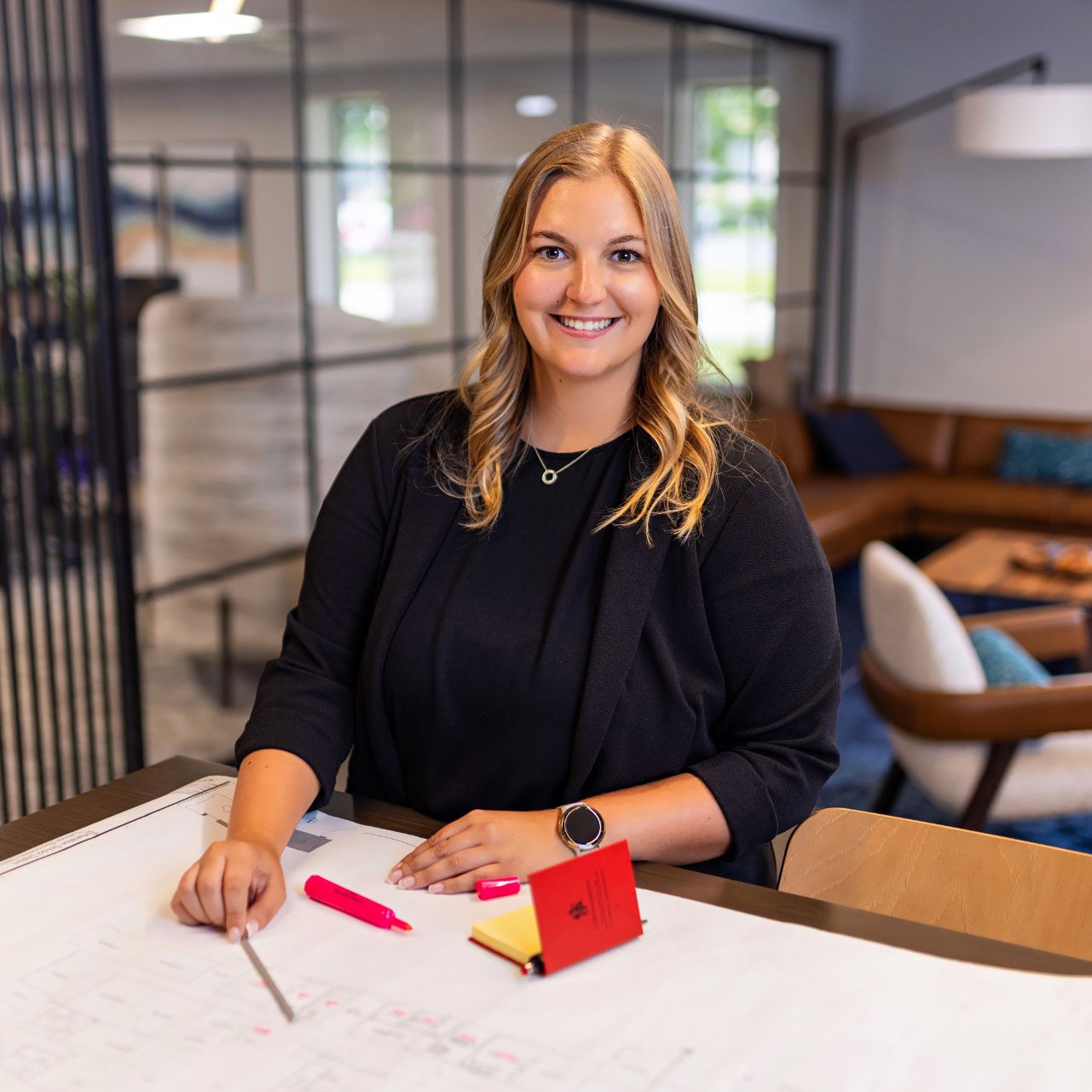 Maddy Carbon, Project Manager at CJ & Associates, leading commercial interior projects across Wisconsin in corporate, healthcare, education, government, and manufacturing sectors.